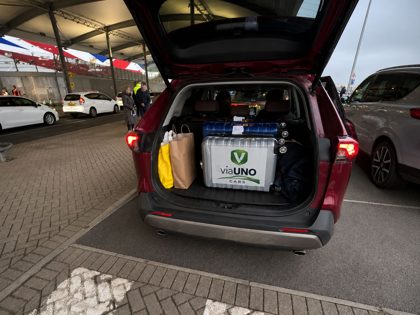 viaUNO Cars branded luggage in vehicle boot at Southampton cruise terminal — cruise embarkation transfer